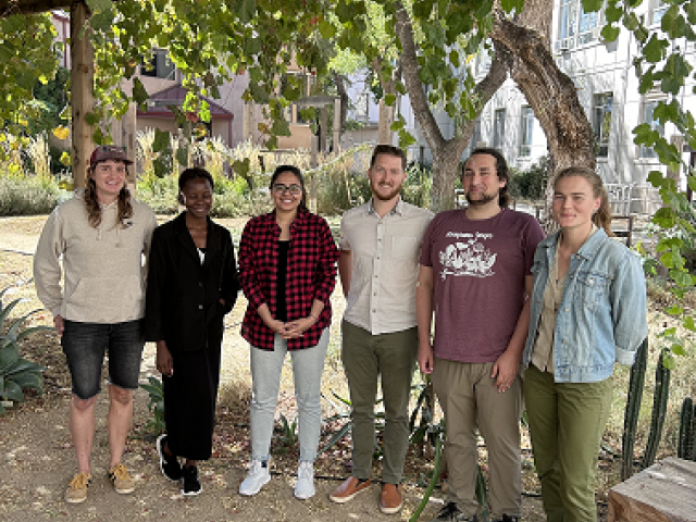 Fall 2023 Cohort smiling outside on first day of orientation